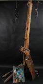 AN ARTISTS EASEL AND PALETTE Used by the artist JOANNE THOMSON (1935-2024) Trained at Chelsea School