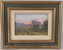 20TH CENTURY SCHOOL Sunset over church spire and rooftops, oil on panel. signed with initials GT, 10