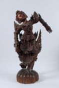 A BURMESE CARVED TEAKWOOD THAILAND DRAGON. 64cms high.