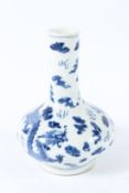 A CHINESE BLUE AND WHITE DRAGON BOTTLE VASE. Four character mark in blue. 22cms high.
