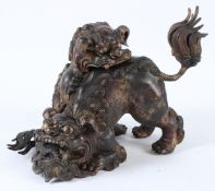 A GOOD BRONZE FOO DOG CENSER with loose head. 40cms long.