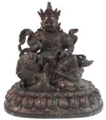 A GILT BRONZE TIBETAN PALDEN LHAMO BUDDHA. 20cms high.