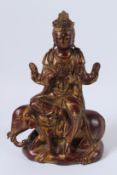 A GILT BRONZE SAMANTABHADRA BUDDHA. 32cms high.