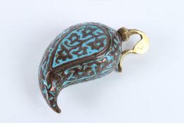 A FINE 19TH CENTURY INDIAN KASHMIRI ENAMELLED BRASS MANGO SHAPED PERFUME BOTTLE. 8cms long.