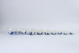 A SET OF NINE VARIOUS SIZED BLUE AND WHITE BOWLS. 12cms to 5cms.