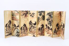 A CHINESE FOLDING BOOK of horses. 27cms x 9.5cms.