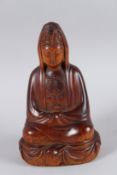 A VERY GOOD 18TH CENTURY CARVED WOOD BUDDHA. 21cms high.