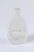 A CHINESE WHITE GLAZE CARVING CHICKEN SNUFF BOTTLE. 9cms.
