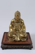 A GOOD BRASS STATUE OF SHAKYAMUNI BUDDHA seated in the lotus position (PADMASANA). 18cms high.