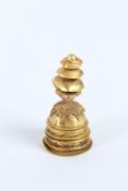 A RARE AND IMPORTANT SOLID HIGH CARAT GOLD STUPA, possibly South East Asian. 22grams.