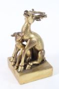 A CHINESE BRONZE DOUBLE DEER SEAL. 17cms high.