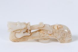 A CHINESE JADE BUCKLE.