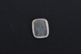 A SMALL CARVED ROCK CRYSTAL featuring the head of a king. 2cms x 1.5cms.