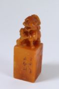 A CHINESE SOAPSTONE SEAL. 12cms high.