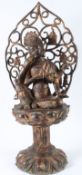 A GOOD LARGE CHINESE BRONZE DEITY WITH HALO. 75cms high.