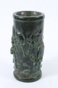 A CHINESE CARVED JADE TALL VASE carved with horned cattle.