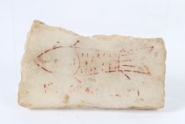 A WHITE MARBLE FRAGMENT Qa'a Ashmoleum, etched with a fish. 9.5cms x 5cms.