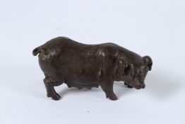 A JAPANESE BRONZE OKIMONO SOW. 7.5cms.