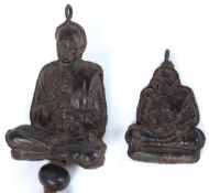 A RARE SMALL LEATHER DEITY or MONK. 19th Century TIBETAN, with tassel, 12cms high, and a MONK,