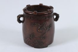 A CHINESE BRONZE INCENSE BURNER. 12cms high.