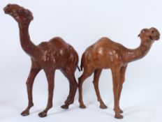 TWO LIBERTY OF LONDON LEATHER CAMELS. 36cms and 30cms high.