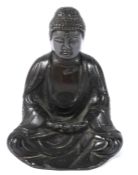 A THAI SPELTER FIGURE OF A SEATED BUDDHA. 17cms high.