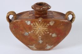 AN OTTOMAN LEATHER DECORATED WATER FLASK with two handles. 18cms high.