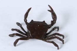 A JAPANESE BRONZE OKIMONO SMALL CRAB. 8.5cms.