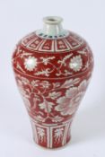 A CHINESE UNDERGLAZE RED MEIPING. 34cms high.