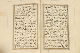 AN 18TH - 19TH CENTURY OTTOMAN TURKISH LEATHER BOUND ILLUSTRATED QURAN in a leather binding. 19cms