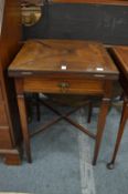 An Edwardian mahogany envelope card table.