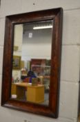 A marquetry inlaid rectangular wall mirror.