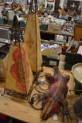 Three unusual decorative lamps, one modelled as a lizard, the other two of conical form.
