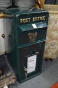 A reproduction cast iron post box.
