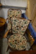Two Ercol armchairs.