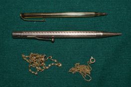 A Mabie Todd & Co propelling pencil another pencil and two gilt metal chains.