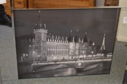 A mirrored frame decorative print of Paris at night.