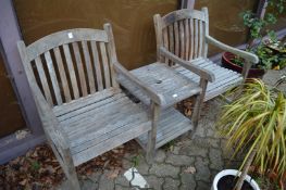 A garden double seat bench with table.