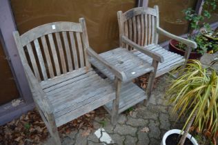 A garden double seat bench with table.