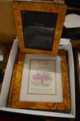 Four burr wood photograph frames.