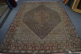 A good Persian design carpet, beige ground with stylised floral decoration, 290cm x 210cm.
