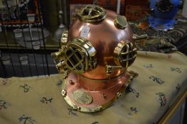 A good reproduction copper and brass divers helmet.