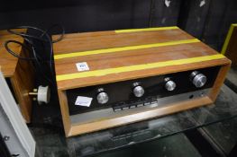 A Sugden A21 stereo integrated amplifier together with a Sugden FM stereo tuner and accessories.