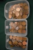 Three boxes of pre-decimal pennies.