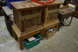 A pair of pine bedside chests on stands.