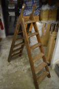 An old pine step ladder.