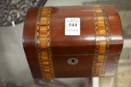 An inlaid mahogany tea caddy.