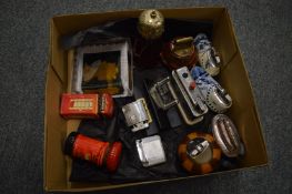 Various table lighters and other items.