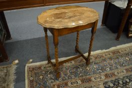 An oak occasional table.