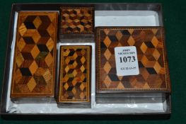 Tunbridge ware, four parquetry decorated boxes and covers.